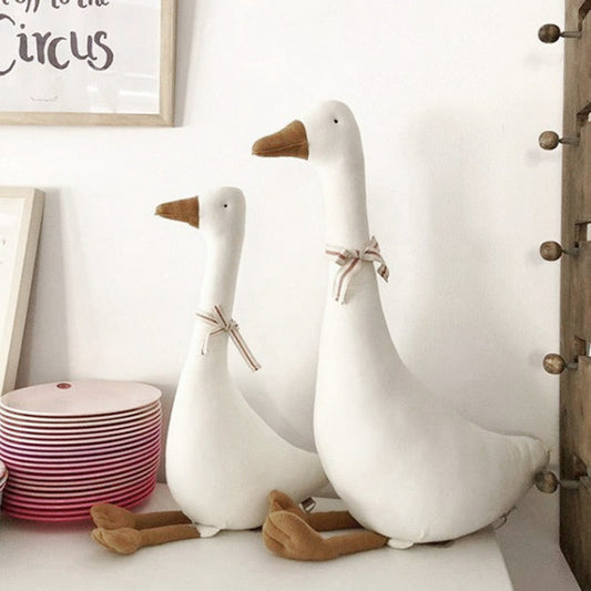 Gans-Plüschtier und Kuschelkissen
