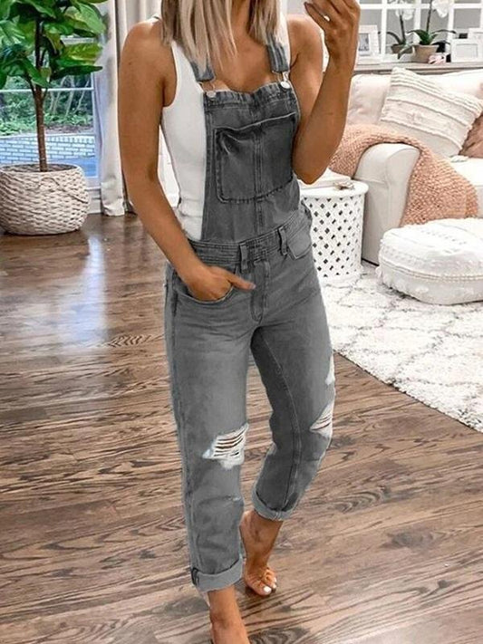 Locker geschnittene Damen-Jeanslatzhose mit Rissen
