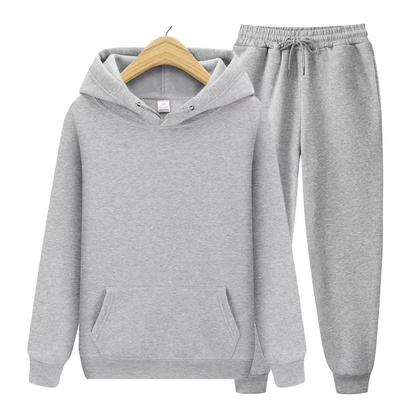 Unisex zweiteiliges Trainingsset mit Kapuzenpullover und Trainerhose aus weichem Material im lockeren Schnitt