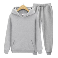 Unisex zweiteiliges Trainingsset mit Kapuzenpullover und Trainerhose aus weichem Material im lockeren Schnitt